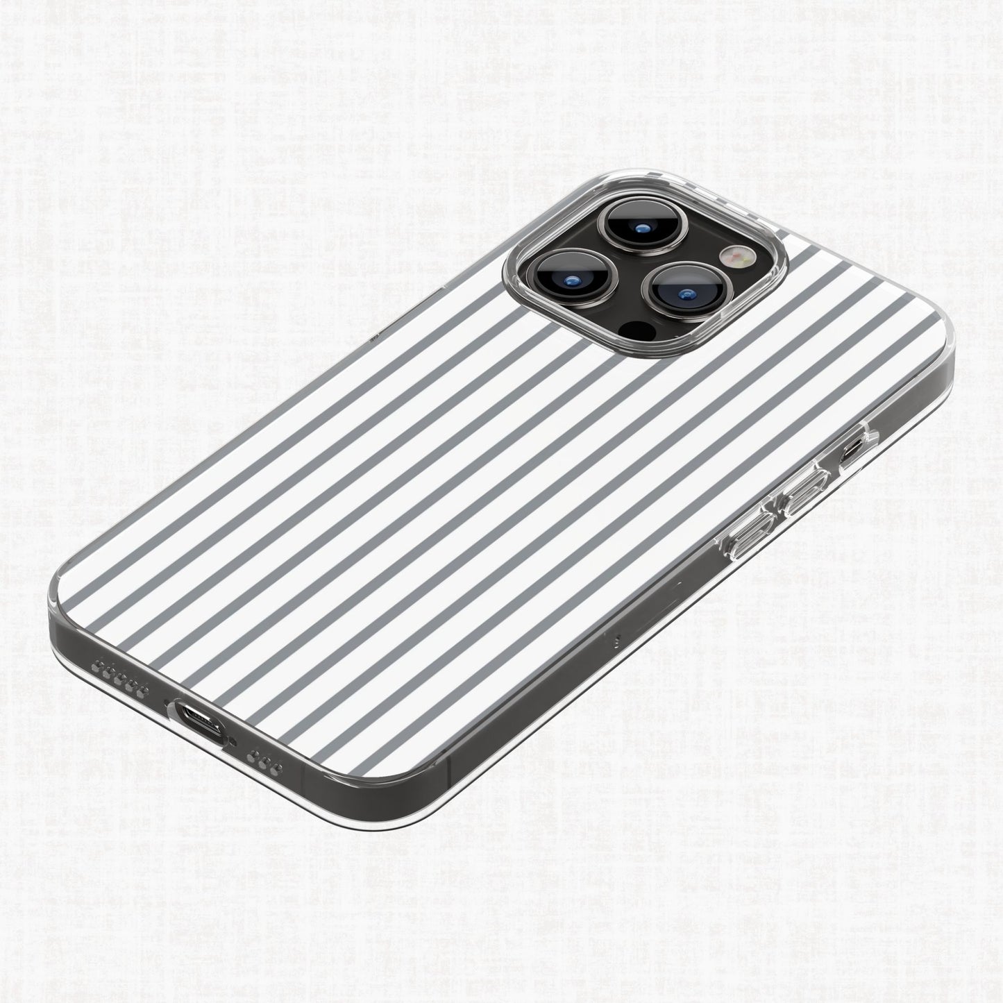 Grey and white striped Essential Geo pattern shown on a mockup of a clear phone case