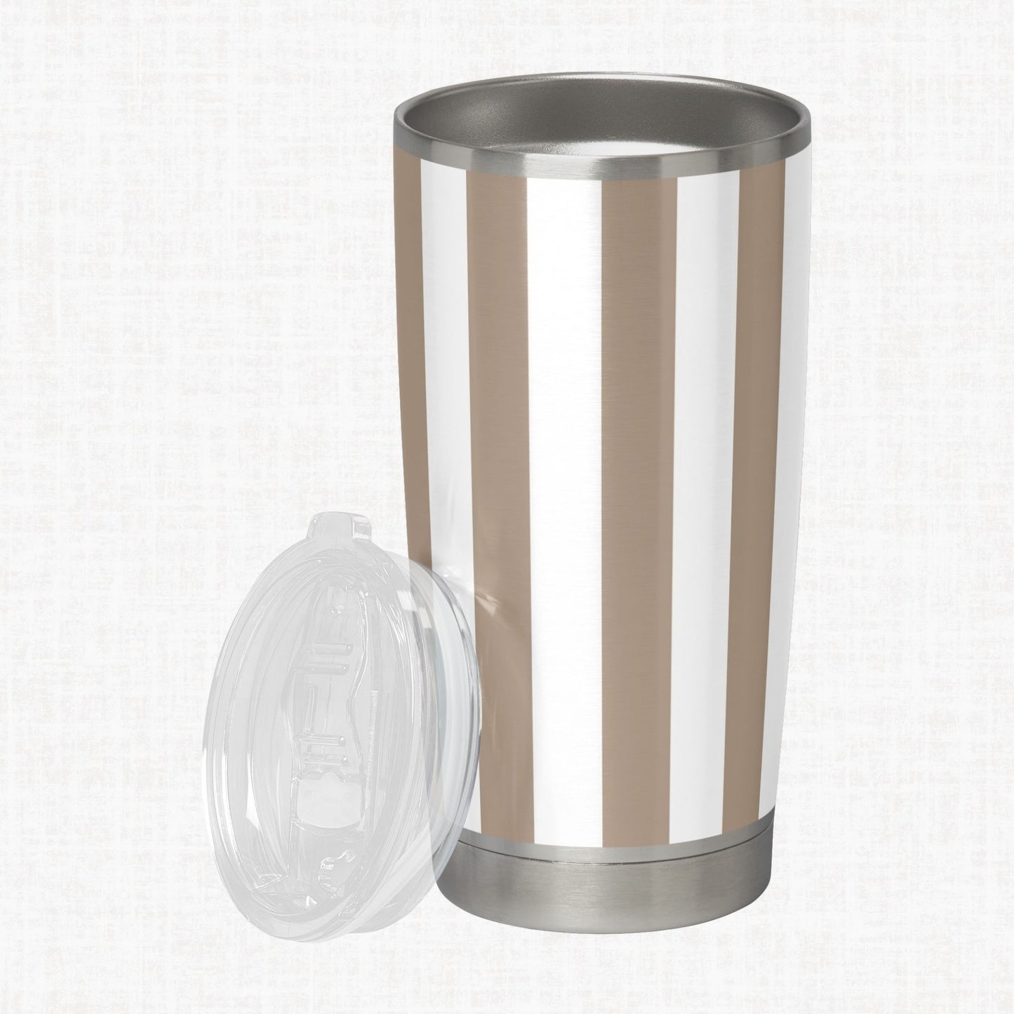 Greige and white wide diagonal stripe pattern shown on a stainless steel tumbler as a product-use example.